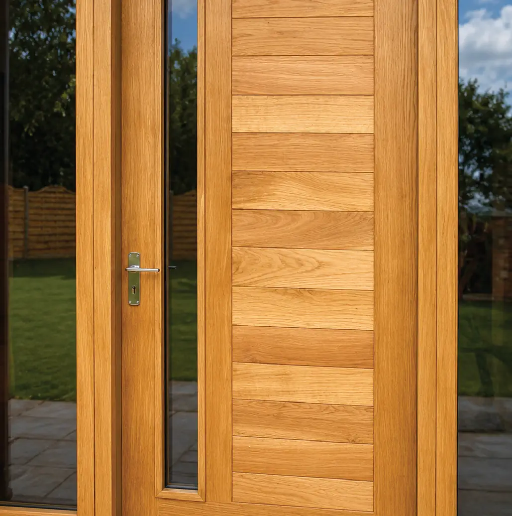 Contemporary oak front door with a full-height glazed sidelight